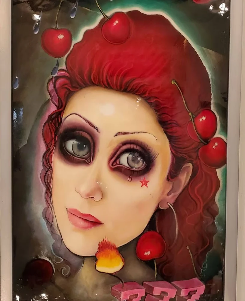 Illustrated woman with cherries and red hair.