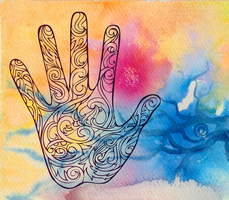 Decorated hand on vibrant watercolor wash