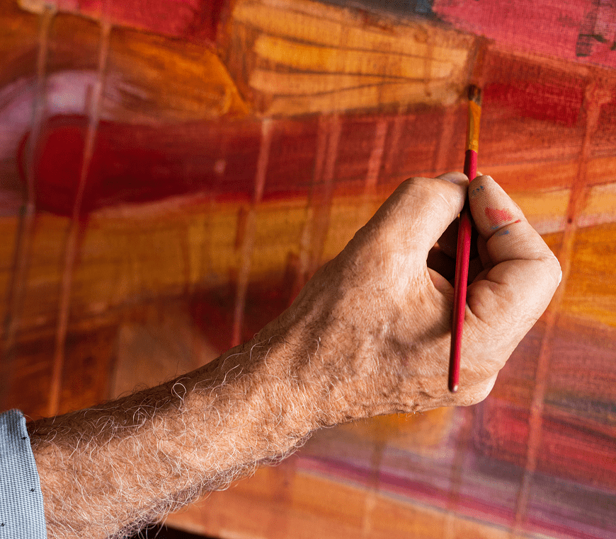 Close-up of hand painting abstract art
